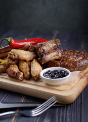 Grilled sausages and chicken