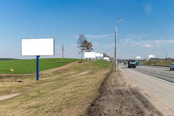 large billboards near the highway transportation hub