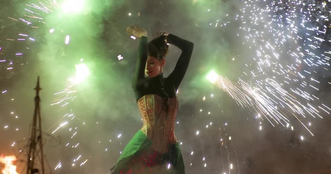Fire performer woman, fire show. Slow motion