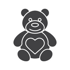 Teddy bear with heart shape icon