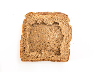 Sandwich bread slices with hole, on white background.