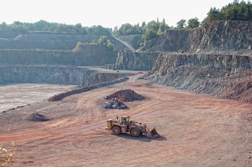 Fototapeta premium view into a quarry mine of porphyry rock