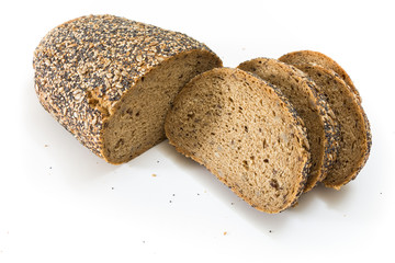 Whole wheat bread with seeds sliced, on white background.
