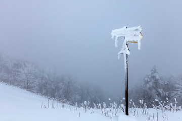 Frozen sign in the mountain