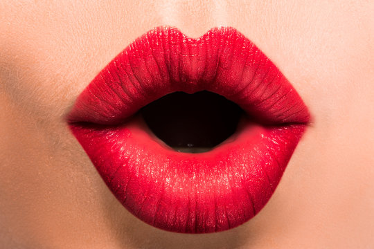 Beautiful female lips close-up.