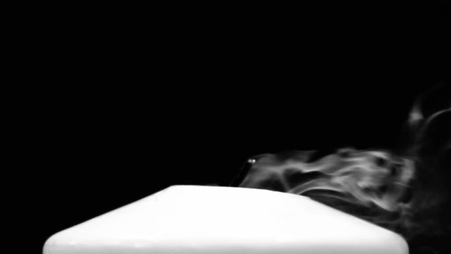 Candle light blow out in black and white shot on R3D Epic super slow motion
