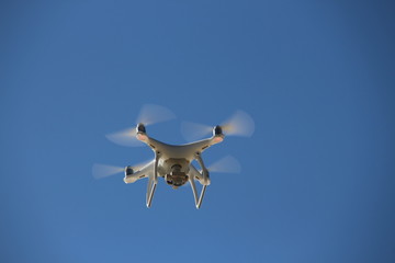 Fototapeta na wymiar Drone flying in the clear sky