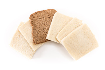 White no crust sandwich bread slices with one of them wholesome brown, on white background.