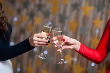 Celebration. People holding glasses of champagne making a toast