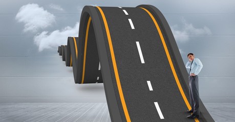 Digital composite image of businessman standing on wavy road
