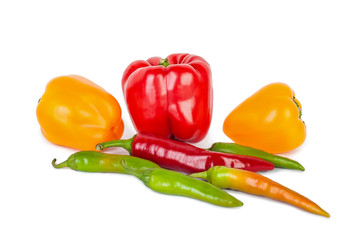 Multicolored salad and hot pepper isolated on a white background