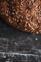 Bread on dark wooden table at bakery