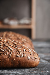 Bread on dark wooden table at bakery