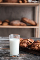 Croissants on dark wooden table