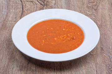 Vegetable soup on a wooden table