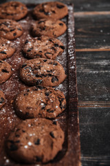 Cookies on desk on dark wooden table