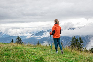 Young woman hiking in the mountains