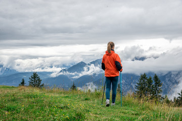 Young woman hiking in the mountains