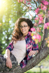 Girl with pink blossom tree
