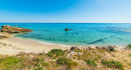 Fototapeta na wymiar Turquoise sea in Santa Giusta beach