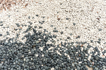piles of black and white stones