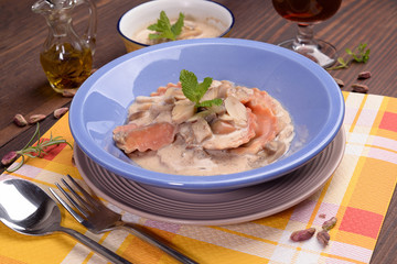 Cooked ravioli with radicchio and mushroom cream