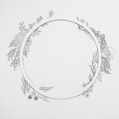 Floral round frame with drawing leaves