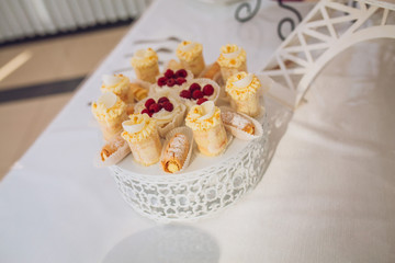 Candy bar on wedding ceremony with a lot of different candies and beverages