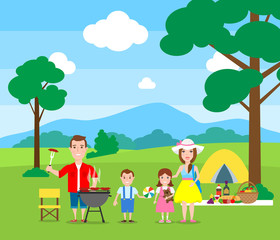 happy family having picnic in nature and making barbecue.summer vacation