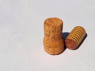 Closeup the bottle wine cork/stopper on white background, under sunlight.
