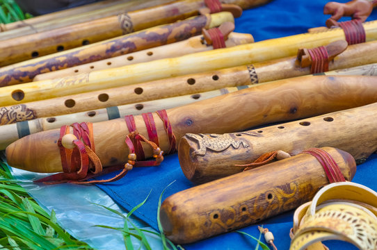 Many different beautiful wooden flutes handmade