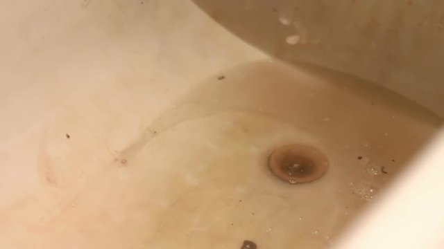 Dirty Water and drain Near the black plunger