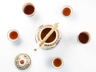 High angle view of a set of tea pot on a white background