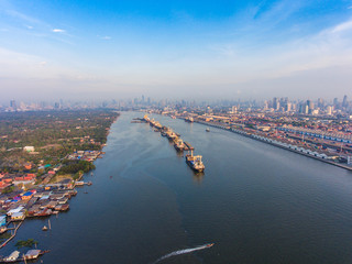 Obraz premium Aerial view of industrial port with containers