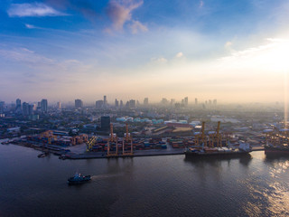 Naklejka premium Aerial view of industrial port with containers