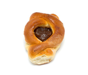 Sweet bun with apricot jam isolated on white