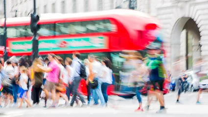 Foto op Plexiglas Piccadilly circus with lots of people, tourists and Londoners crossing the junction. Red bus at the background. Blurred type image © IRStone