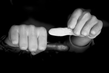 Black and white colored thumbs.Concept of genderinequality.