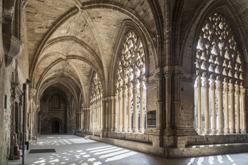 Old Cathedral, interior cloister,Catedral de Santa Maria de la Seu Vella, gothic style, iconic monument in the city of Lleida, Catalonia,Spain. - obrazy, fototapety, plakaty