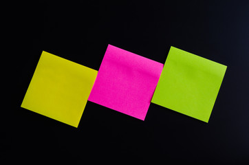 blank sticky note or post note colorful on blackboard.