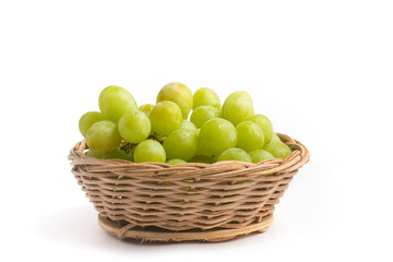 White Grapes into a Basket