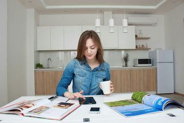 Teenage girl studying reading book at home