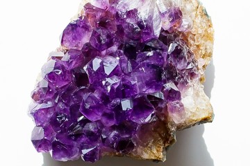 Crystals of violet amethyst in the form of a human head in profile