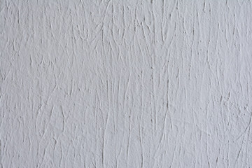 Texture of painted plaster wall relief inside, abstract background