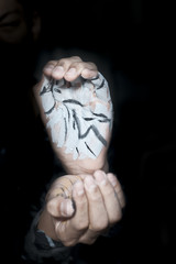 Human hand painted with poster color.