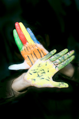 Human hand painted with poster color.