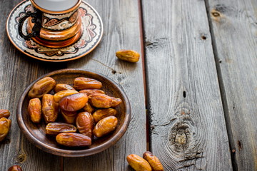 Tea with mint in arab style  on wooden table.