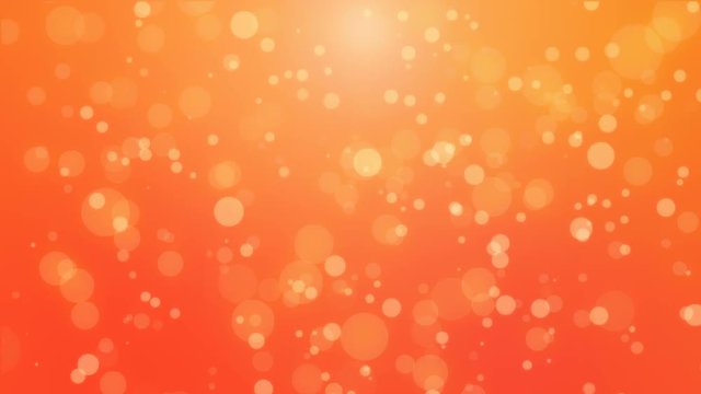 Beautiful red orange glowing bokeh background with floating light particles.