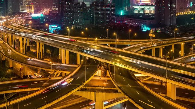 Famous highway intersection in Shanghai, China. Many intersecting highways with fast moving traffic. 4k Time lapse.