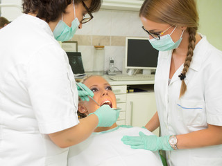 Obraz premium Girl having a dental examination